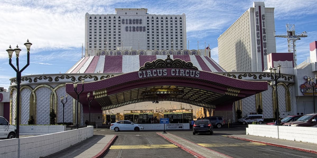 Circus Circus porte-cochere with striped big-top roof and the hotel towers behind it