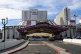 Circus Circus porte-cochere with striped big-top roof and the hotel towers behind it
