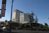 Downtown Grand hotel tower and its street-level entrance on a clear evening