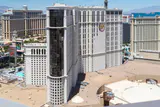 Planet Hollywood's hotel tower with its PH logo, seen from above with Strip resorts behind