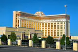 The South Point hotel tower and low casino building under a clear blue sky