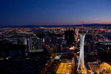 Aerial view at dusk of the north end of the Las Vegas Strip with the Stratosphere Tower in the foreground
